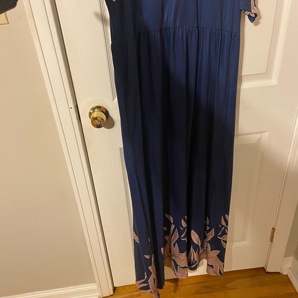 Navy Blue Floral Cold Shoulder Maxi Dress
Measurements in photos runs small - Picture 2 of 8